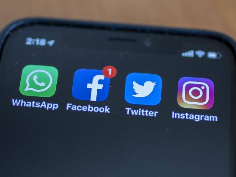 Social media companies have been urged to enforce their own rules after a federal MP was defamed.