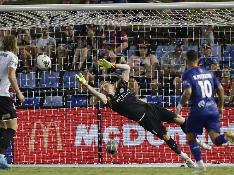 Tom Glover pulls off a fine save while keeping a clean sheet as Melbourne beat Newcastle Jets.