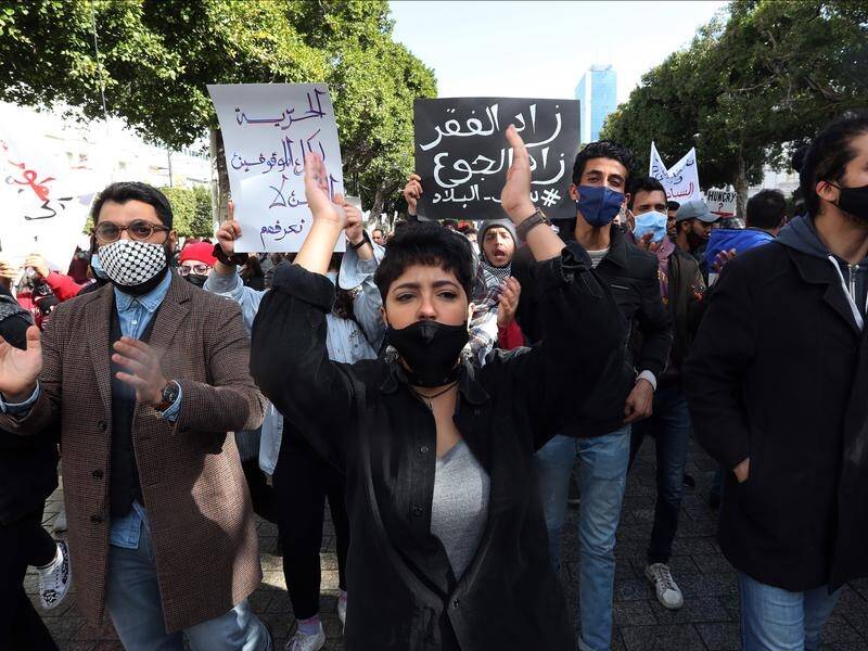 Tunisia has banned protests as it tries to stem coronavirus infections and calm tensions.