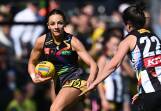 Monique Conti (l) helped Richmond to a 52-point belting of Collingwood in their final game of 2023. (Joel Carrett/AAP PHOTOS)