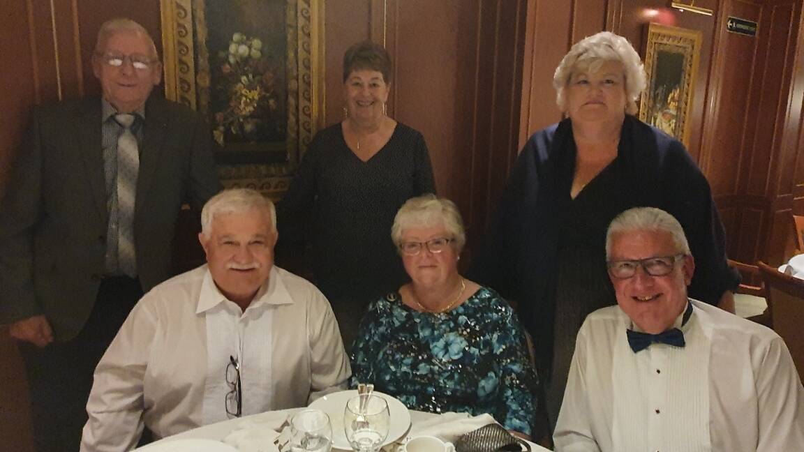 (back) Raymond and Margaret McKeown, Jenny Popov, (front) Dominic and Judy Chircop and Alex Popov on the last night of their Ruby Princess cruise. Photo: SUPPLIED