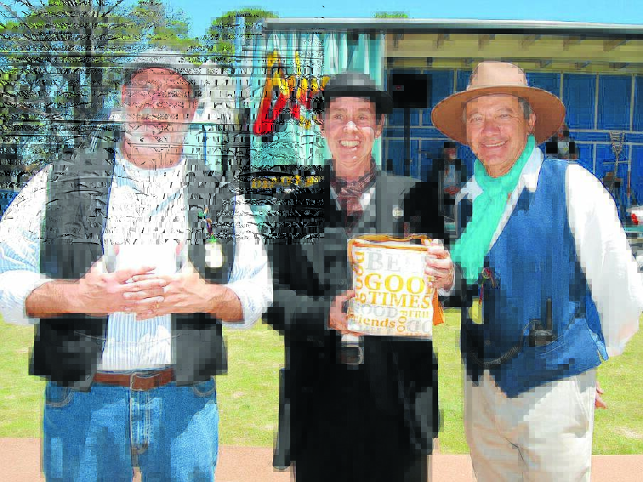 19th century man. Peter Scott (centre) took out the best period costume for men from Peter Ryan (left) and Kim Wong. Maybe the walkie talkie in Kim's pocket swayed the judge in Peter's favour. Photo: Wayne Cock.