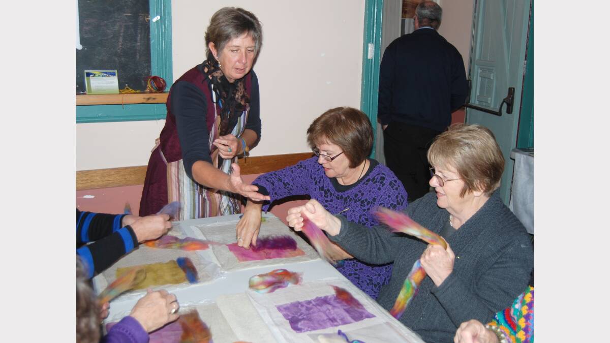 Rachel Meek gives a group of enthusiastic ladies a lesson in felt making at the Natural Fibre Muster held in Carcoar on Saturday. Photo: Wayne Cock.