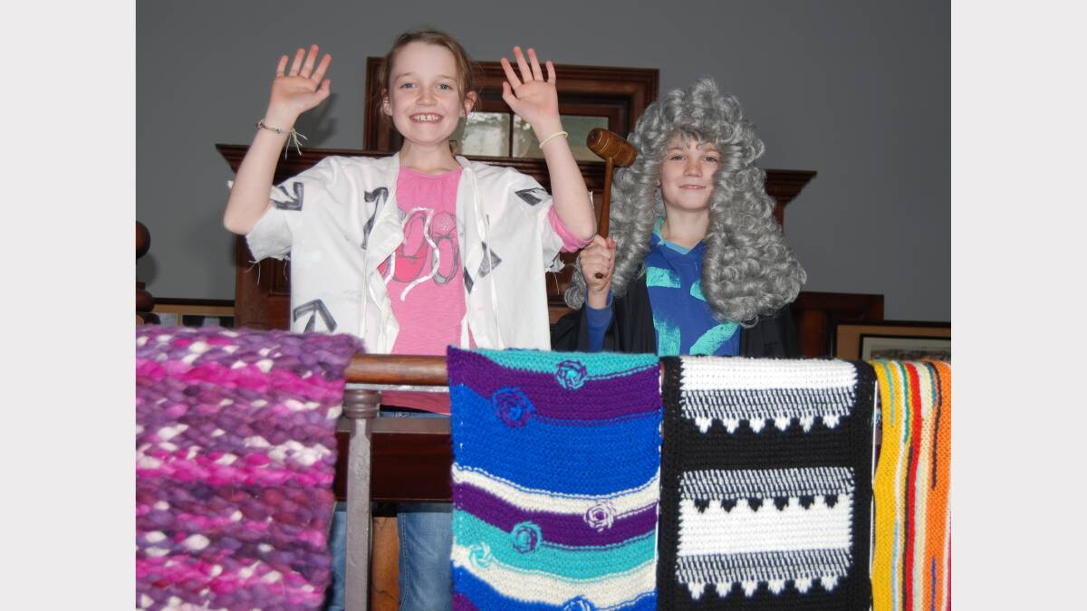 With the Carcoar courthouse adorned with a myriad of craft items, two youngsters, Harriet and Mackenzie Tucknott dressed up for a little fun.  Photo: Wayne Cock.